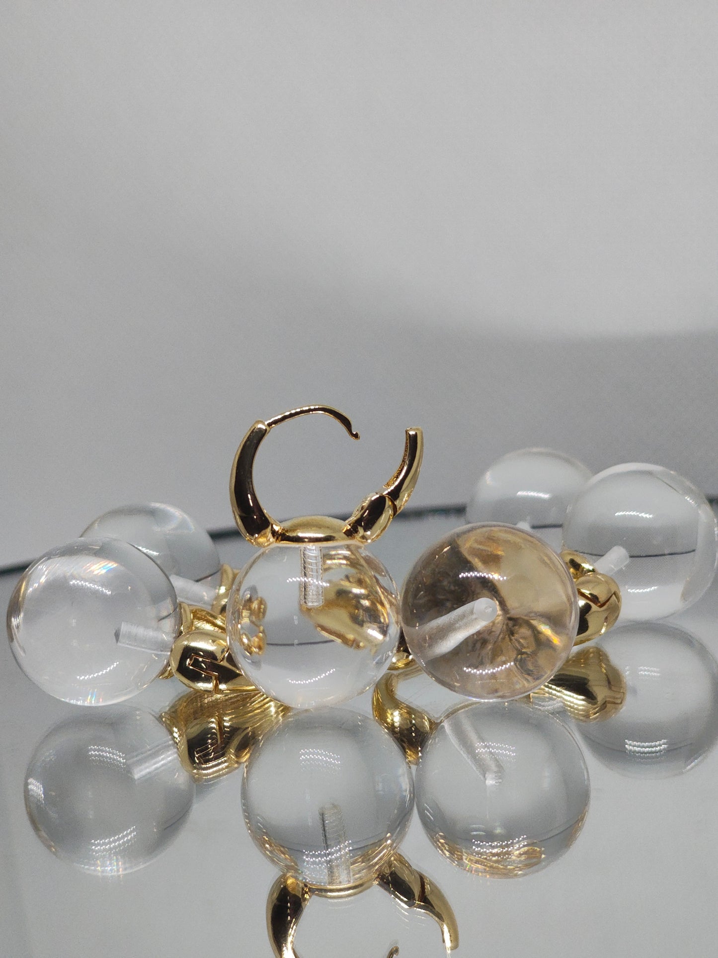 Boucles d'oreilles transparente et doré